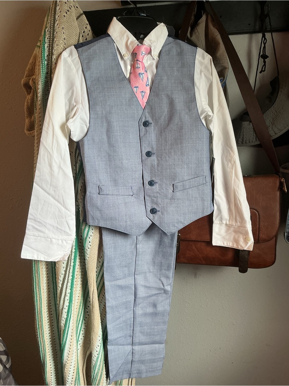 Brand new Nautica boys size 10 4 piece suit. This is a beautiful suit.